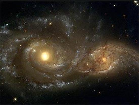 Столкновение двух спиральных галактик...