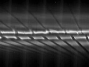 "Кассини" разглядел рождение миниспутников в кольцах Сатурна