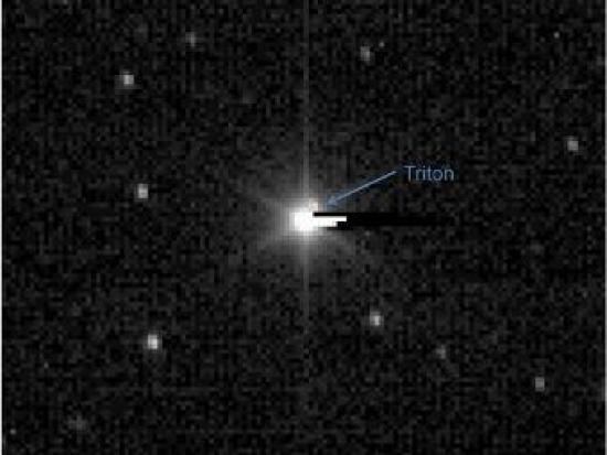 Фото Нептуна и Тритона. NASA/New Hori...
