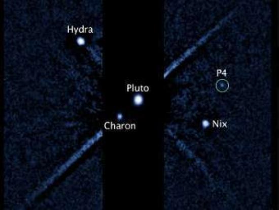 Плутон и его спутники. Изображение NA...