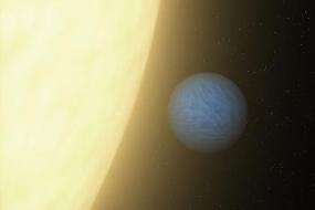 Описана дальняя планетарная система в созвездии Рака