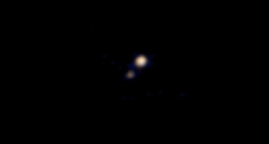 Карликовая планета Плутон и ее спутни...