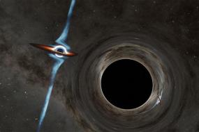 Ученые нашли квазар с двумя гигантскими сталкивающимися черными дырами